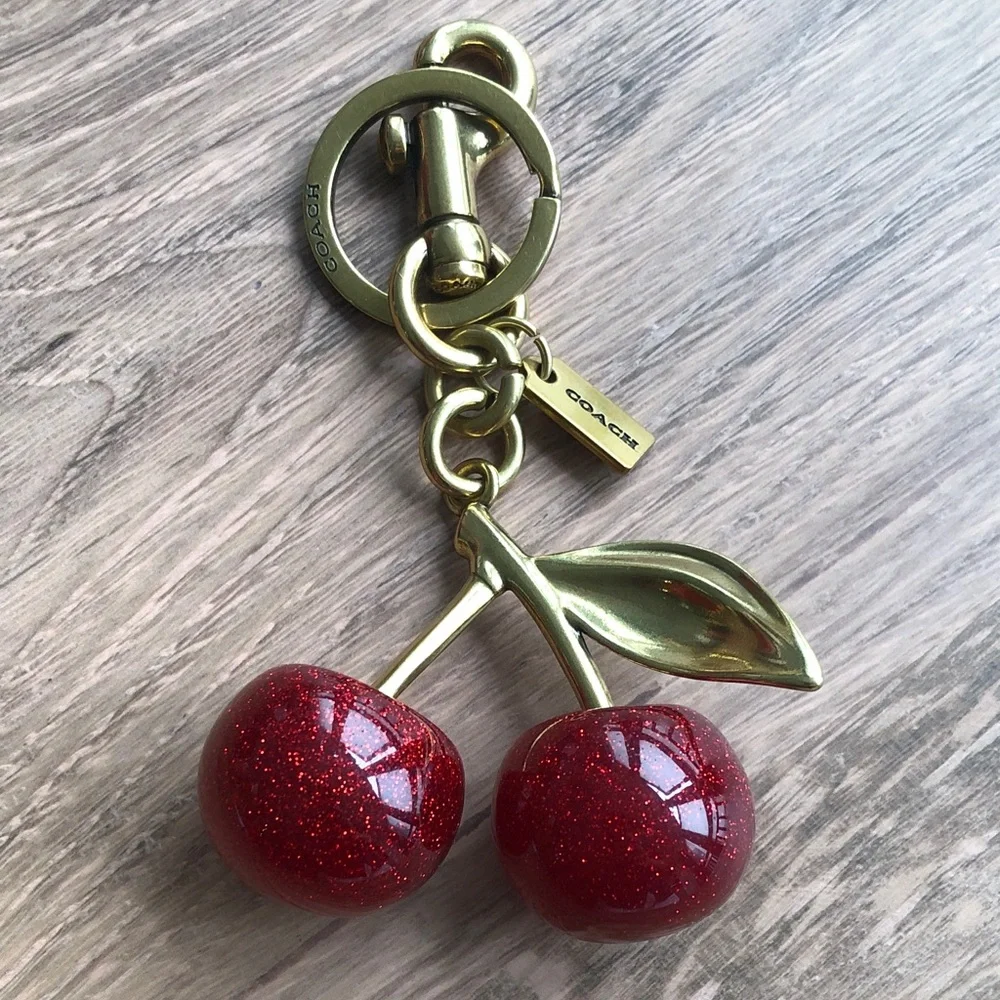 Coach Gold-Tone Keychain with Red Glitter Cherries - Picture 1 of 3